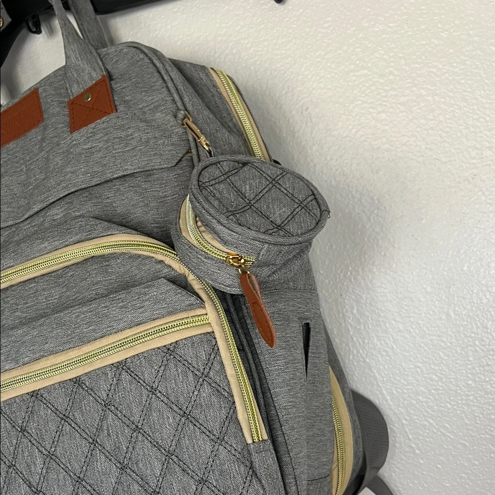 Gray Quilted Backpack with Brown Accents